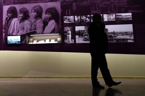 A man stands by archive photographs during an exhibition about the Armenian Genocide at the Armenian Genocide Museum in Yerevan on April 21, 2015. A man stands by archive photographs during an exhibition about the Armenian Genocide at the Armenian Genocide Museum in Yerevan on April 21, 2015. - Sputnik International