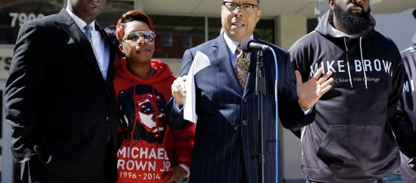 The family of Michael Brown, the unarmed teenager whose death at the hands of police in Ferguson, Mo. sparked protests across the country, has filed a wrongful death lawsuit against the city. The family of Michael Brown, the unarmed teenager whose death at the hands of police in Ferguson, Mo. sparked protests across the country, has filed a wrongful death lawsuit against the city. - Sputnik International