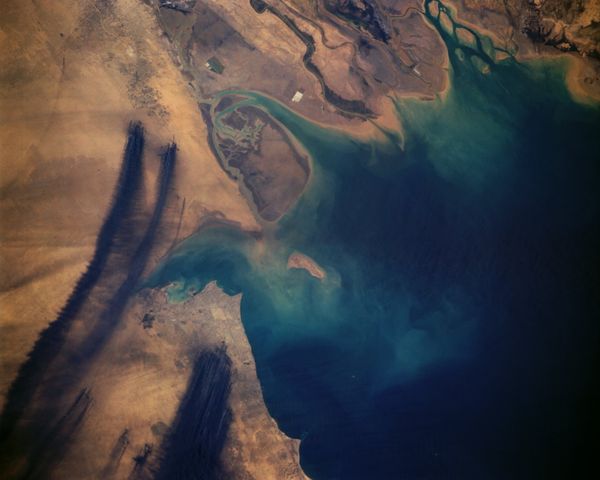 Image of the Kuwaiti Oil Fires taken by a US weather satellite in 1991. Image of the Kuwaiti Oil Fires taken by a US weather satellite in 1991. - Sputnik International