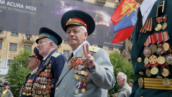 Former Soviet Union army veterans march during a Victory Day celebration, which commemorates the 1945 defeat of Nazi Germany, in the center of Kharkiv, Ukraine, Friday, May 9, 2014 Former Soviet Union army veterans march during a Victory Day celebration, which commemorates the 1945 defeat of Nazi Germany, in the center of Kharkiv, Ukraine, Friday, May 9, 2014 - Sputnik International