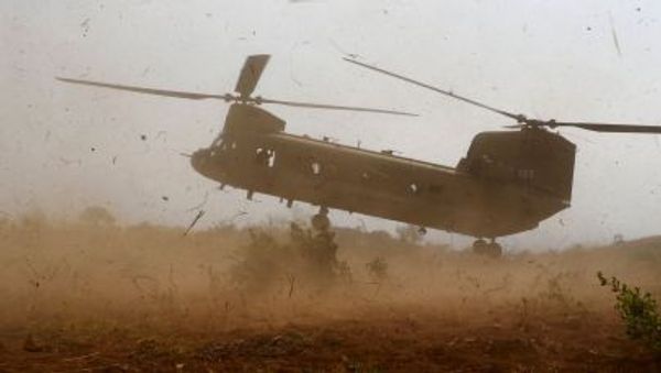 A U.S. military helicopter CH-47 lands during the annual Balikatan (shoulder-to-shoulder) war games with Filipino soldiers at a military camp, Fort Magsaysay, Nueva Ecija in northern Philippines April 20, 2015. - Sputnik International