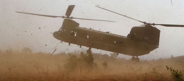 A U.S. military helicopter CH-47 lands during the annual Balikatan (shoulder-to-shoulder) war games with Filipino soldiers at a military camp, Fort Magsaysay, Nueva Ecija in northern Philippines April 20, 2015. A U.S. military helicopter CH-47 lands during the annual Balikatan (shoulder-to-shoulder) war games with Filipino soldiers at a military camp, Fort Magsaysay, Nueva Ecija in northern Philippines April 20, 2015. - Sputnik International