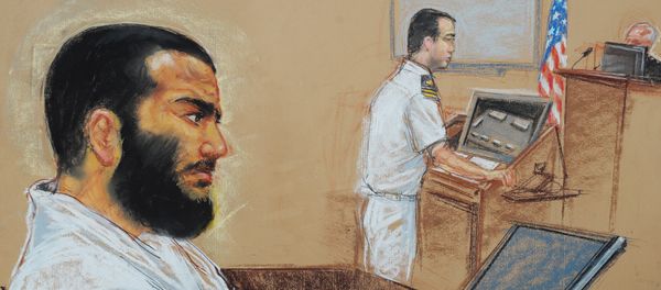 Canadian-born accused terrorist Omar Khadr doodling as his lead defense counsel, Navy Lieutenant Commander William Kuebler, addresses the judge Canadian-born accused terrorist Omar Khadr doodling as his lead defense counsel, Navy Lieutenant Commander William Kuebler, addresses the judge - Sputnik International