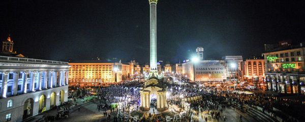 Kiev residents during memorial events on the anniversary of the first protests on Independence Square in Kiev. - Sputnik International