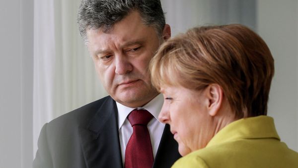 Ukrainian President Petro Poroshenko meets with German Chancellor Angela Merkel Ukrainian President Petro Poroshenko meets with German Chancellor Angela Merkel - Sputnik International