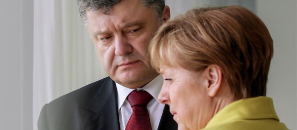 Ukrainian President Petro Poroshenko meets with German Chancellor Angela Merkel Ukrainian President Petro Poroshenko meets with German Chancellor Angela Merkel - Sputnik International