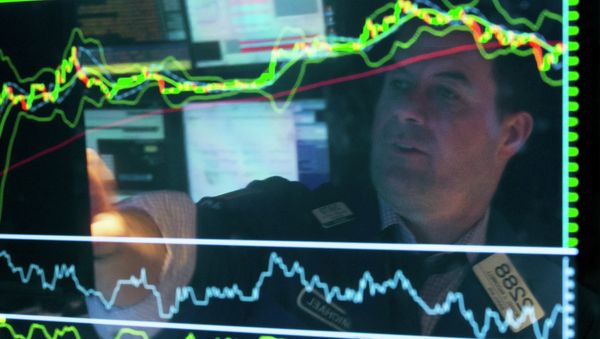 Specialist Michael McDonnell is reflected in a screen at his post on the floor of the New York Stock Exchange, Friday, March 20, 2015 Specialist Michael McDonnell is reflected in a screen at his post on the floor of the New York Stock Exchange, Friday, March 20, 2015 - Sputnik International