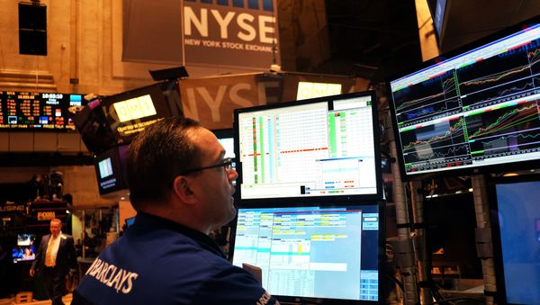 A trader works on the floor of the New York Stock Exchange (NYSE) on February 6, 2015 A trader works on the floor of the New York Stock Exchange (NYSE) on February 6, 2015 - Sputnik International