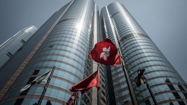  Hong Kong flag (centre-R) fluttering next to the Chinese national flag (centre-L) outside the stock exchange building in Hong Kong - Sputnik International