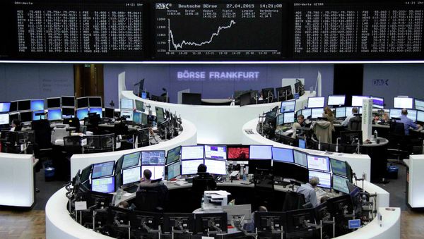 Traders are pictured at their desks in front of the DAX board at the Frankfurt stock exchange April 27, 2015 Traders are pictured at their desks in front of the DAX board at the Frankfurt stock exchange April 27, 2015 - Sputnik International
