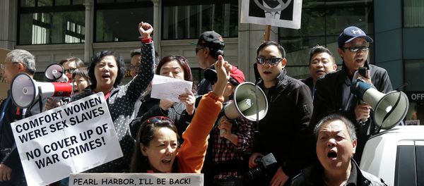 Chinese American and Korean American protesters hold up signs and yell as they rally outside of Japanese Consulate in San Francisco, Tuesday, April 28, 2015 Chinese American and Korean American protesters hold up signs and yell as they rally outside of Japanese Consulate in San Francisco, Tuesday, April 28, 2015 - Sputnik International