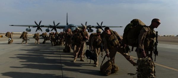 US Marines walk in line after arriving in Kandahar on October 27, 2014, as British and US forces withdraw from the Camp Bastion-Leatherneck complex in Helmand province US Marines walk in line after arriving in Kandahar on October 27, 2014, as British and US forces withdraw from the Camp Bastion-Leatherneck complex in Helmand province - Sputnik International