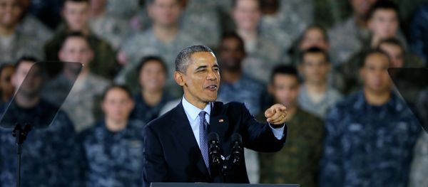 President Barack Obama speaks to military members and families Monday, Dec. 15, 2014, at Joint Base McGuire-Dix-Lakehurst, in Wrightstown, N.J. President Barack Obama speaks to military members and families Monday, Dec. 15, 2014, at Joint Base McGuire-Dix-Lakehurst, in Wrightstown, N.J. - Sputnik International