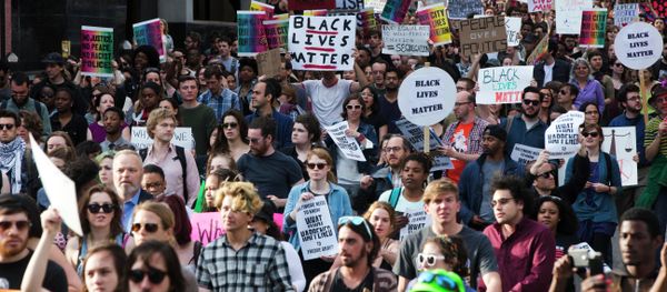 Protestors march Wednesday, April 29, 2015, in Baltimore. Protestors march Wednesday, April 29, 2015, in Baltimore. - Sputnik International