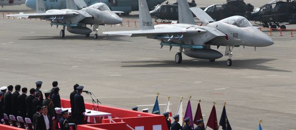 Japanese Prime Minister Shinzo Abe reviews Japan Self-Defense Forces' F-15J fighter jets at Hyakuri Air Base. Japanese Prime Minister Shinzo Abe reviews Japan Self-Defense Forces' F-15J fighter jets at Hyakuri Air Base. - Sputnik International