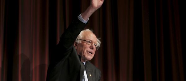 U.S. Senator Bernie Sanders (D-VT) waves to the audience before speaking at the opening of the 2015 National Action Network Convention in New York City U.S. Senator Bernie Sanders (D-VT) waves to the audience before speaking at the opening of the 2015 National Action Network Convention in New York City - Sputnik International