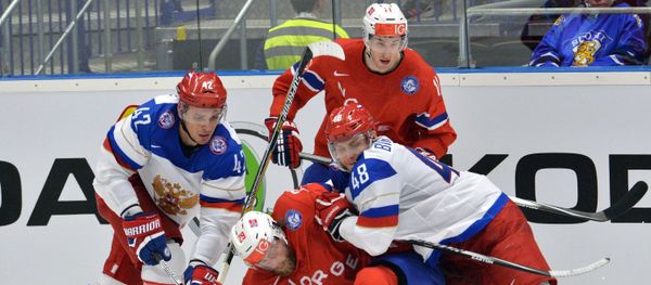 The player of the Russian hockey team Artem Anisimov, Norwegian hockey players Robin Dahlstrom, Andreas Stene, Russian hockey player Evgeny Biryukov during the hockey match, April 2, 2015 The player of the Russian hockey team Artem Anisimov, Norwegian hockey players Robin Dahlstrom, Andreas Stene, Russian hockey player Evgeny Biryukov during the hockey match, April 2, 2015 - Sputnik International