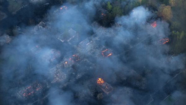 Fire hits an abandoned village - Sputnik International