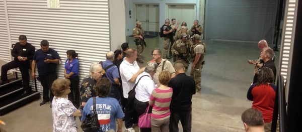 People are sequestered by members of the Garland Police Department inside the Curtis Culwell Center, Sunday, May 3, 2015, in Garland, Texas. - Sputnik International