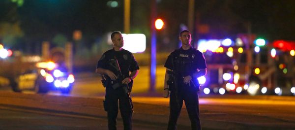 Police officers block an intersection near the Curtis Culwell Center after a shooting outside the Muhammad Art Exhibit and Contest, sponsored by the American Freedom Defense Initiative which was being held at the facility in Garland, Texas May 3, 2015. - Sputnik International