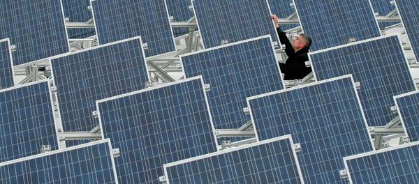 Solar modules on the roof of the Soemtron AG in Soemmerda, Germany Solar modules on the roof of the Soemtron AG in Soemmerda, Germany - Sputnik International