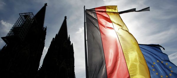 Flags of Germany and the EU fly with black ribbons during a memorial service for the 150 victims of Germanwings flight 4U 9525 in Cologne's Cathedral, April 17, 2015 Flags of Germany and the EU fly with black ribbons during a memorial service for the 150 victims of Germanwings flight 4U 9525 in Cologne's Cathedral, April 17, 2015 - Sputnik International