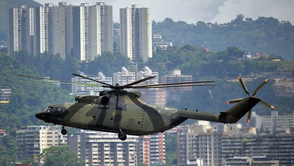 Russian-made Mi-26 military helicopter overflies Caracas - Sputnik International
