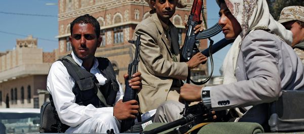 Houthi Shiite rebels ride in a military truck while patrolling a street in Sanaa, Yemen - Sputnik International