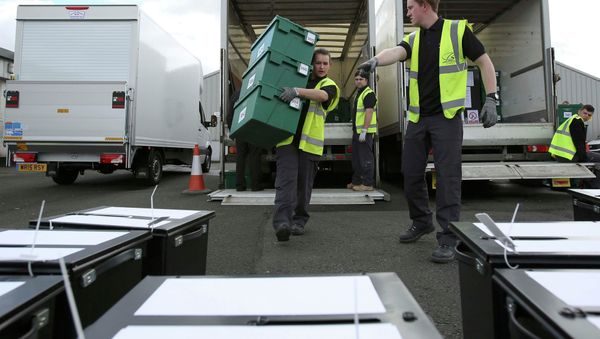 City council workers assemble ballot boxes for distribution ahead of tomorrow's general election, in Glasgow, Scotland, Britain, May 6, 2015 City council workers assemble ballot boxes for distribution ahead of tomorrow's general election, in Glasgow, Scotland, Britain, May 6, 2015 - Sputnik International