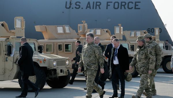 Ukraine's President Petro Poroshenko passes by U.S. armored Humvees in Boryspil Airport, Kiev, Ukraine - Sputnik International