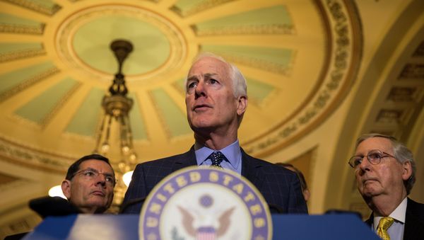 Senate Majority Whip John Cornyn of Texas, accompanied by Sen. John Barrasso, R-Wyo., and Senate Majority Leader Mitch McConnell,of Ky., speaks to reporters on Capitol Hill in Washington - Sputnik International