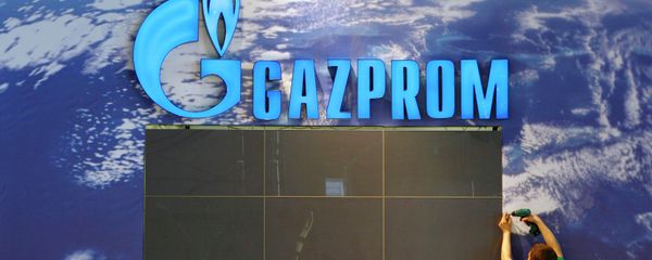An employee assembles parts at the booth of Russian company Gazprom in preparation of the Hanover industrial fair in Hanover, Germany - Sputnik International