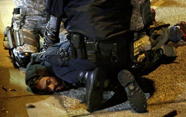A protester is taken into custody in Ferguson, Mo. A protester is taken into custody in Ferguson, Mo. - Sputnik International