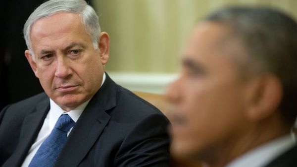 Israeli Prime Minister Benjamin Netanyahu listens as President Barack Obama speaks during their meeting in the Oval Office of the White House in Washington, Wednesday, Oct. 1, 2014. - Sputnik International