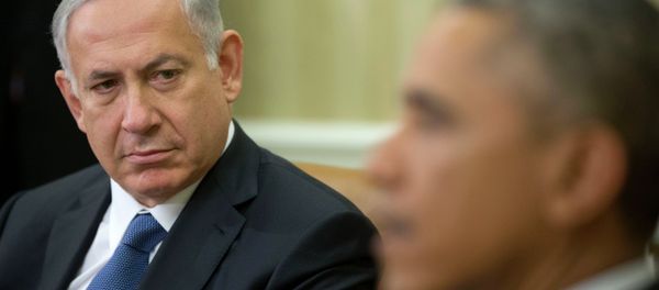 Israeli Prime Minister Benjamin Netanyahu listens as President Barack Obama speaks during their meeting in the Oval Office of the White House in Washington, Wednesday, Oct. 1, 2014. - Sputnik International