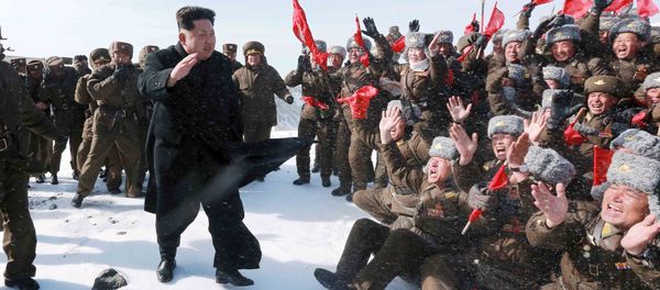 North Korean leader Kim Jong Un greets Korean People's Army pilots during a visit to the summit of Mt Paektu April 18, 2015 - Sputnik International
