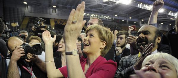 Leader of the Scottish National Party (SNP), Nicola Sturgeon (C) reacts to results at the Glasgow election count at the Emirates Arena in Glasgow on May 8, 2015 - Sputnik International