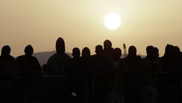 Migrants wait to disembark from the Iceland Coast Guard vessel Tyr, at the Messina harbor, Sicily, southern Italy Migrants wait to disembark from the Iceland Coast Guard vessel Tyr, at the Messina harbor, Sicily, southern Italy - Sputnik International