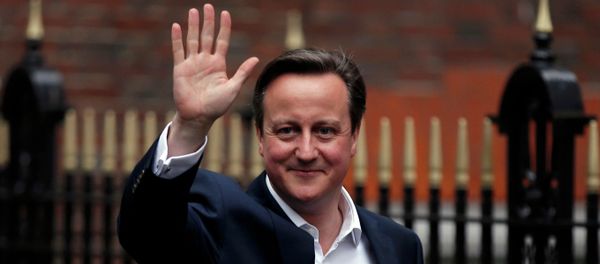 Britain's Prime Minister David Cameron waves as he leaves the Conservative Party headquarters in London, Britain May 8, 2015 Britain's Prime Minister David Cameron waves as he leaves the Conservative Party headquarters in London, Britain May 8, 2015 - Sputnik International