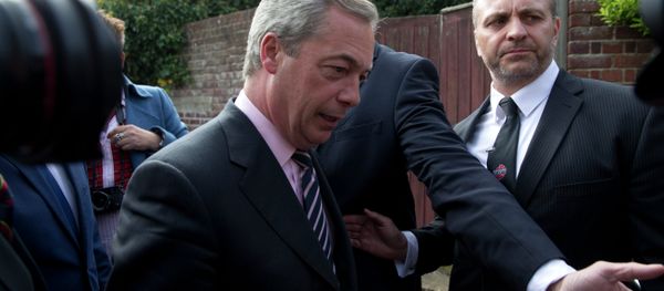 Nigel Farage the leader of the UK Independence Party (UKIP) arrives for the announcement of the official count for the South Thanet parliamentary seat at the Winter Gardens in Margate, south east England, Friday, May 8, 2015 Nigel Farage the leader of the UK Independence Party (UKIP) arrives for the announcement of the official count for the South Thanet parliamentary seat at the Winter Gardens in Margate, south east England, Friday, May 8, 2015 - Sputnik International