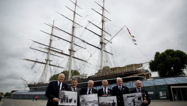 Veterans who served in Britain's Merchant Navy pose with a selection of Royal Mail Merchant Navy stamps during a launch at the Cutty Sark clipper vessel in London, Wednesday, Sept. 18, 2013 Veterans who served in Britain's Merchant Navy pose with a selection of Royal Mail Merchant Navy stamps during a launch at the Cutty Sark clipper vessel in London, Wednesday, Sept. 18, 2013 - Sputnik International