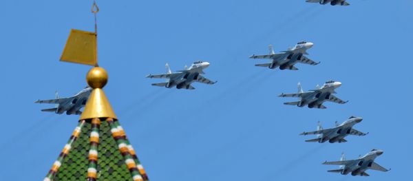 Sukhoi Su-30SM Flanker-C and Su-35S Super-Flanker fighters fly by during rehearsal for parade Sukhoi Su-30SM Flanker-C and Su-35S Super-Flanker fighters fly by during rehearsal for parade - Sputnik International