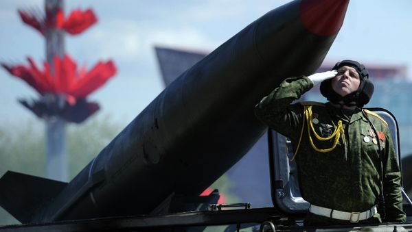 This file photo shows Belarusian military troops take part in the Victory day parade in Minsk on May 9, 2015 - Sputnik International