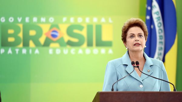 Brazilian President Dilma Rousseff delivers a speech on May 8, 2015, during a ceremony at the Planalto Palace in Brasilia to mark the 70th anniversary of the victory over Nazi Germany during World War II Brazilian President Dilma Rousseff delivers a speech on May 8, 2015, during a ceremony at the Planalto Palace in Brasilia to mark the 70th anniversary of the victory over Nazi Germany during World War II - Sputnik International
