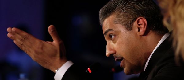 One of two Al Jazeera journalists awaiting trial in Egypt has announced plans to sue his employer for $100 million, alleging that the network was negligent. One of two Al Jazeera journalists awaiting trial in Egypt has announced plans to sue his employer for $100 million, alleging that the network was negligent. - Sputnik International