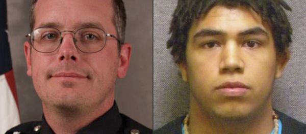 Prosecutors in Wisconsin announced Tuesday that they will not press charges against the white Madison police officer who shot and killed a biracial teenager, Tony Robinson, in March. Prosecutors in Wisconsin announced Tuesday that they will not press charges against the white Madison police officer who shot and killed a biracial teenager, Tony Robinson, in March. - Sputnik International