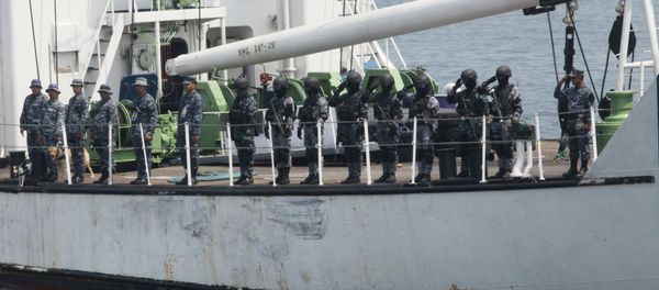 The Philippine Coast Guard personnel salute coast guard officials following a combined maritime exercise by Philippine and Japanese Coast Guards. The Philippine Coast Guard personnel salute coast guard officials following a combined maritime exercise by Philippine and Japanese Coast Guards. - Sputnik International