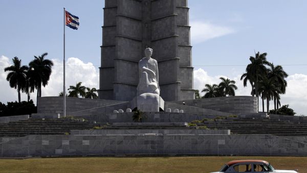 A car drives past the memorial monument of Cuban Independence hero Jose Marti in Havana's Revolution Square A car drives past the memorial monument of Cuban Independence hero Jose Marti in Havana's Revolution Square - Sputnik International