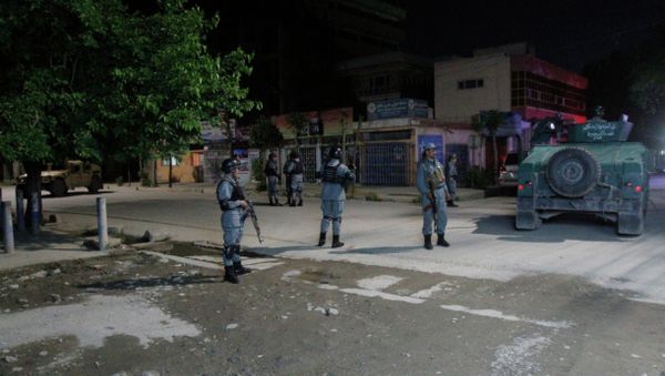 Afghan security forces inspect the site of a Park Palace Hotel attack by Taliban militants, in Kabul, Afghanistan, Wednesday, May 13, 2015 Afghan security forces inspect the site of a Park Palace Hotel attack by Taliban militants, in Kabul, Afghanistan, Wednesday, May 13, 2015 - Sputnik International