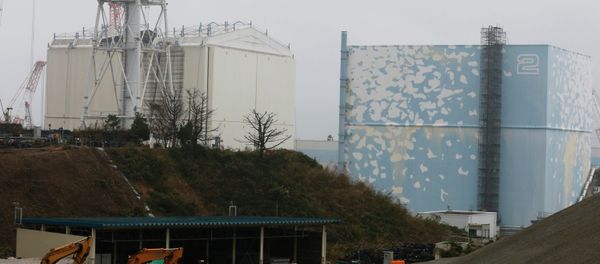 A part of the roof of a building covering the Unit 1 reactor, left, is seen removed at the Fukushima Dai-ichi nuclear power plant in Okuma, Fukushima prefecture, northeastern Japan, Wednesday, Nov. 12, 2014 A part of the roof of a building covering the Unit 1 reactor, left, is seen removed at the Fukushima Dai-ichi nuclear power plant in Okuma, Fukushima prefecture, northeastern Japan, Wednesday, Nov. 12, 2014 - Sputnik International
